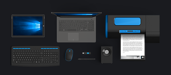 Overview of a complete computer setup with laptop, monitor, printer, keyboard, mouse, and accessories